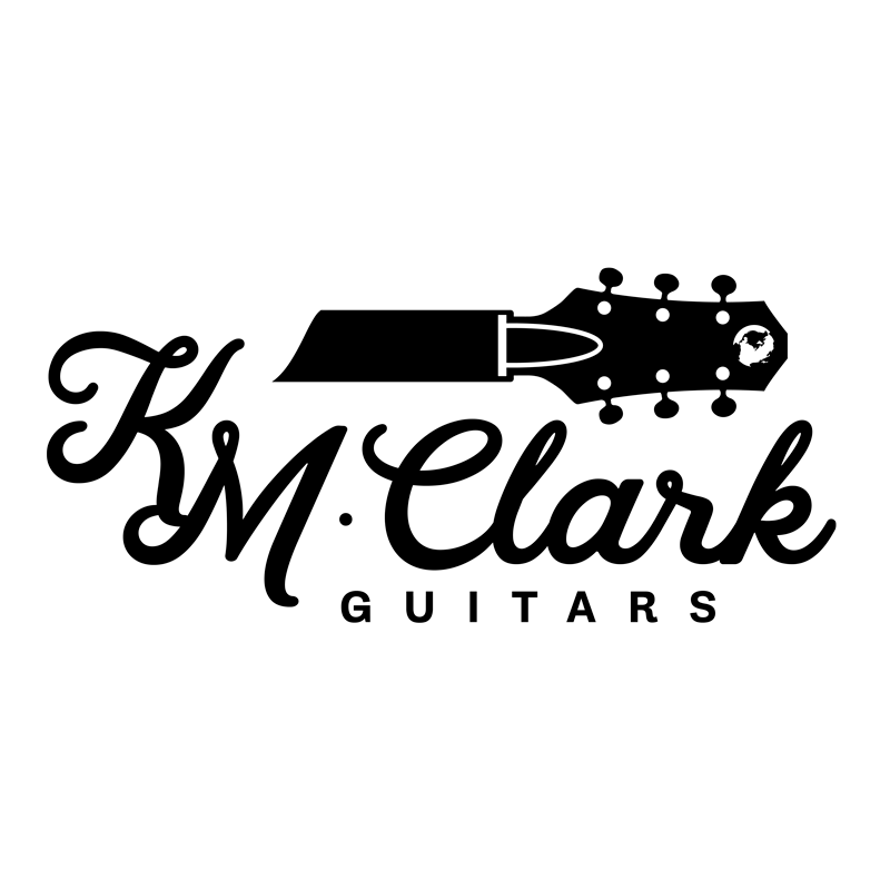 km clark guitars logo